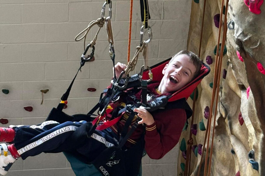 MLD boy Bendrigg Trust climbing wall