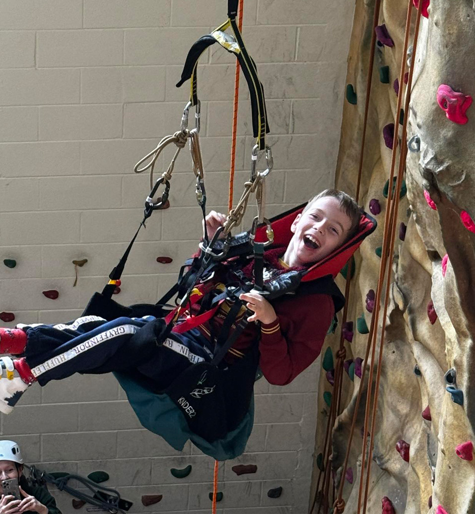 MLD boy Bendrigg Trust climbing wall